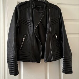 wilson’s leather black biker jacket with zipper detailing